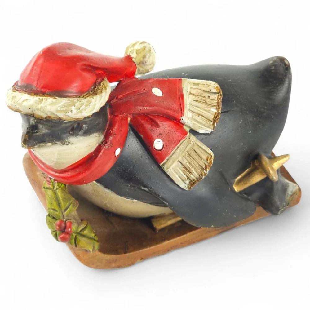 TII Collections Vintage Penguin Sledding Skiing Resin Figurine